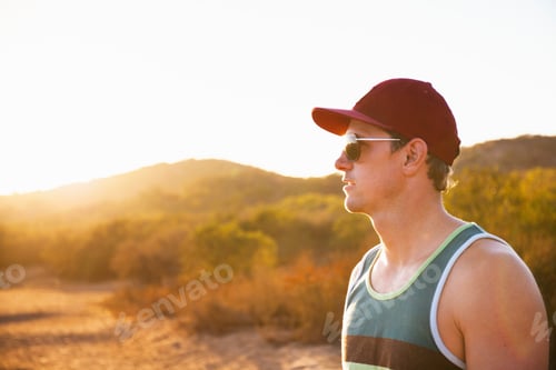 Preview: Male jogger in sunglasses and baseball cap, Poway, CA, USA