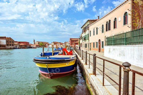 Preview: Daylight view to Venetian Lagoon canal with parked boats