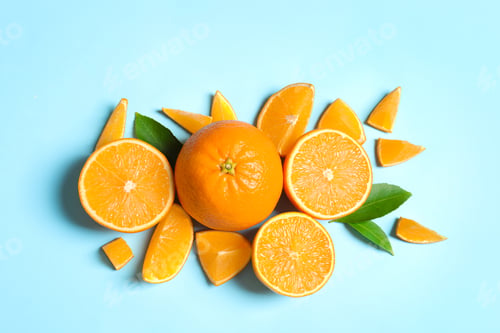 Preview: Flat lay composition with ripe oranges on color background