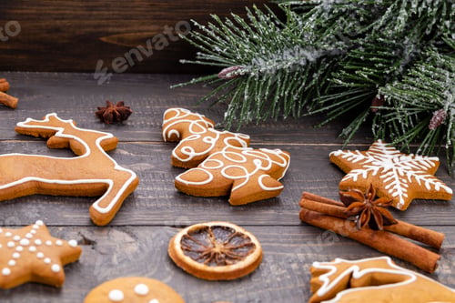 Preview: Homemade christmas gingerbread cookies on wooden table.