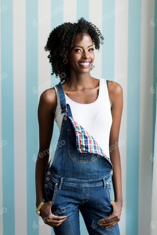 Preview: Woman posing by the wall