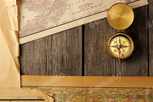 Preview: Vintage Compass and Antique Maps on Wooden Table