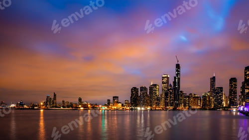 Preview: Panoramic view of Chicago city high rise buildings cloudy sky in the evening