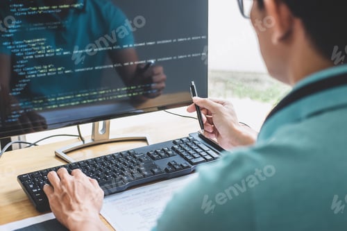 Preview: Young Professional programmer working at developing programming and website working in a software