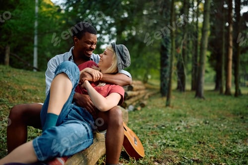 Preview: Young happy couple in love enjoying in nature.