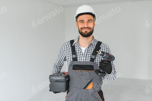 Preview: Portrait of a builder on a construction site indoors