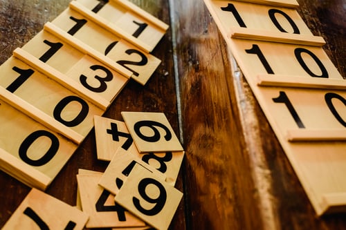 Wooden numbers in tables to learn mathematics in a Montessori classroom. Wooden numbers in tables to learn mathematics in a Montessori classroom.