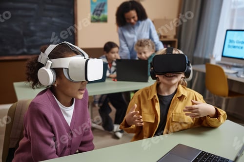 Preview: Children wearing VR headsets in class
