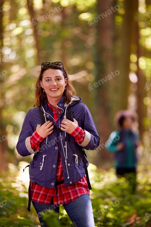 Preview: Portrait Of Woman With Group Of Female Friends On Camping Holiday Hiking In Woods Together