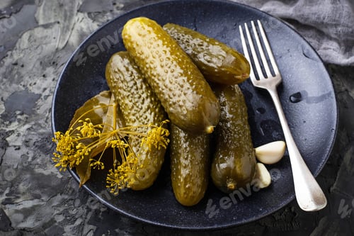 Preview: Pickled cucumbers in black plate