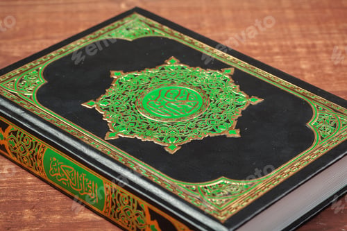 Preview: Koran holy book of Muslims, public item of all muslims on the table , still life