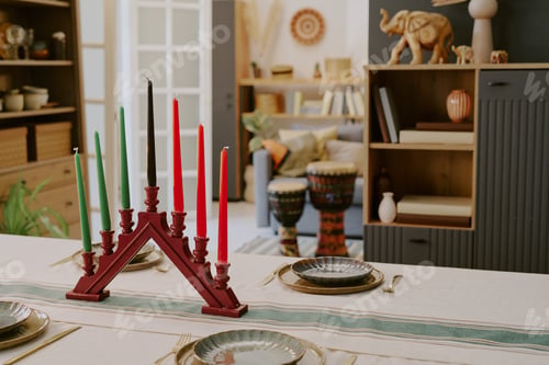 Preview: Kwanzaa Kinara Candle Holder Displaying Lit Candles on Festive Table