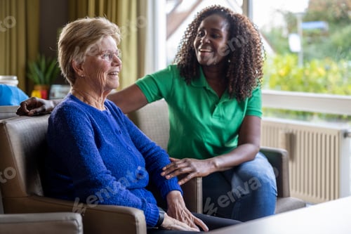 Preview: Helper caring for elderly lady