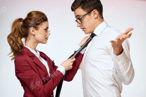 Preview: man and woman work colleagues officials communication light background