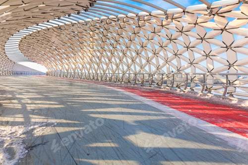 Preview: Modern architectural urbanistic Atyrau fish bridge across Ishim river. Pedestrian bridge with