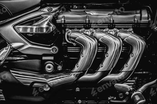 Preview: Motorcycle engine. Closeup superbike engine exhaust pipes art photography in black and white vintage