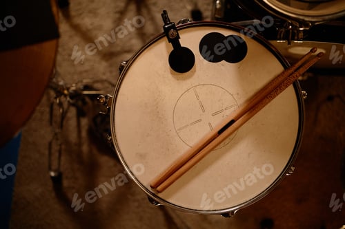 Preview: Used Drumsticks Placed on Drum in Recording Studio
