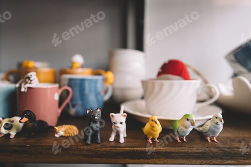 Preview: Little cute animal toy on wooden table