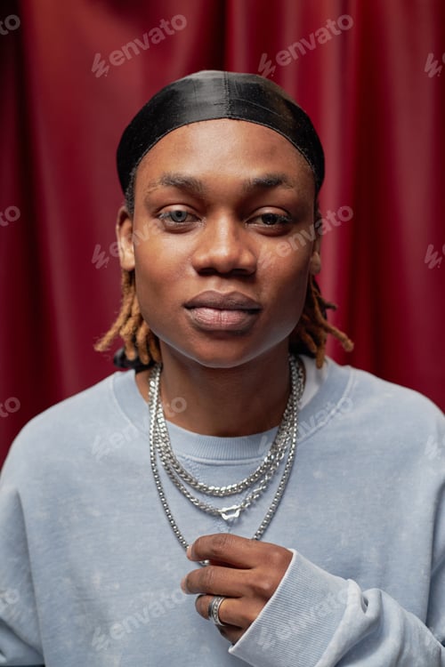 Preview: Portrait of Young Adult Black Man Standing Confidently at Talent Competition