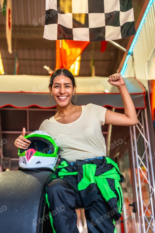 Preview: Smiling Woman with Racing Helmet and Racing Suit