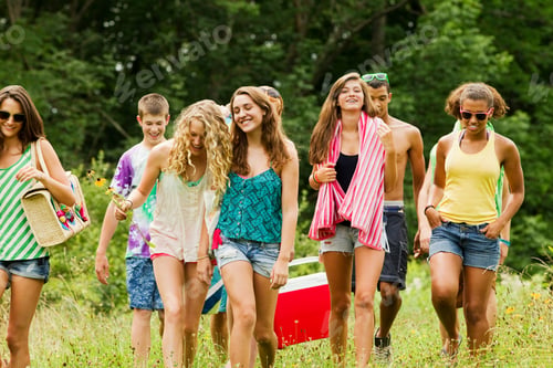 Preview: Teenagers going on a picnic together in the countryside
