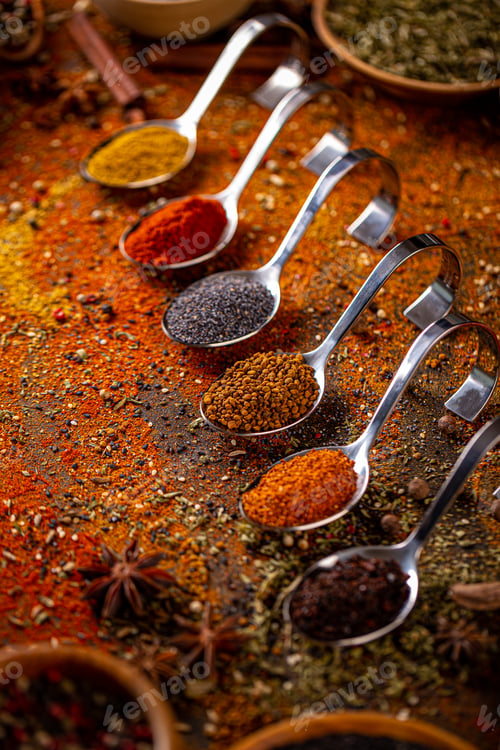 Preview: Different spices in spoons