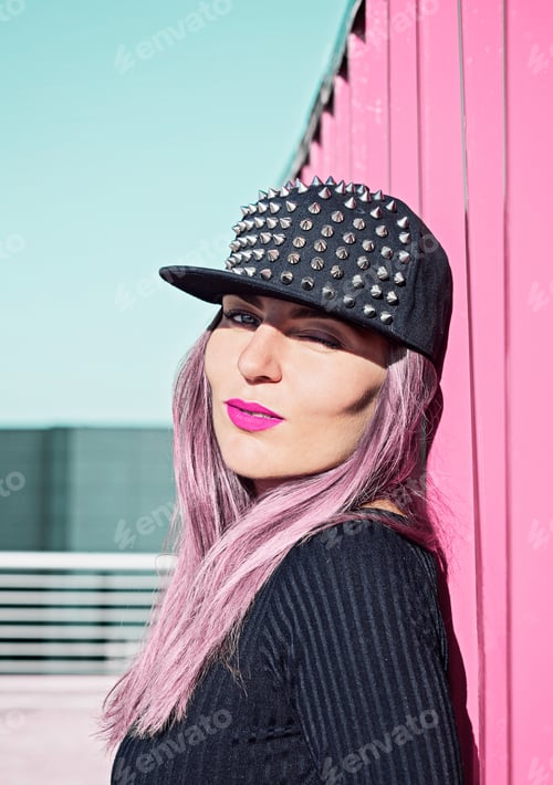 Preview: Beautiful young woman with pink long hair and surreal pink makeup