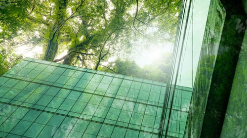 Preview: Eco-friendly building in modern city. Sustainable glass office building with trees for reducing CO2.