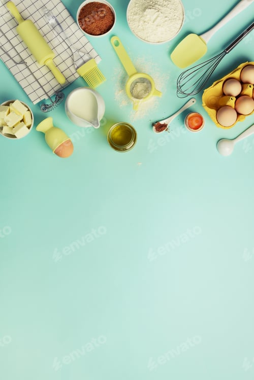 Preview: Baking ingredients - butter, sugar, flour, eggs, oil, spoon, rolling pin, brush, whisk, towel over