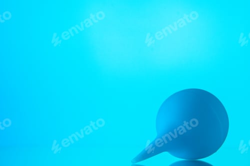 Preview: front view blue syringe bulb on neon blue background