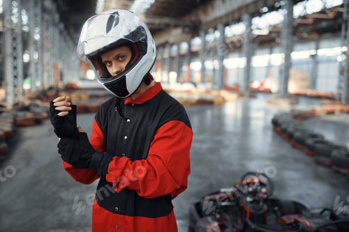 Preview: Racer With Helmet and Gloves in Go-Kart Track