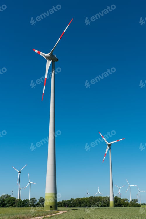 Preview: Windwheels in front of a blue sky