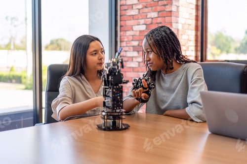 Preview: Teenager children learning with new innovation robotic hand interface hand control in classroom