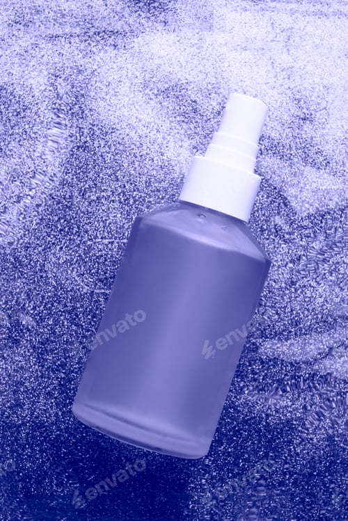 Preview: Transparent cosmetic bottle in water