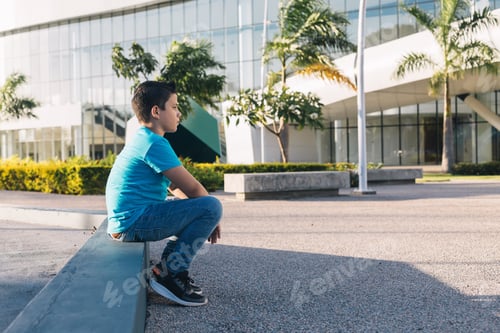 Preview: teenager sitting thinking about life, meditate in surroundings.