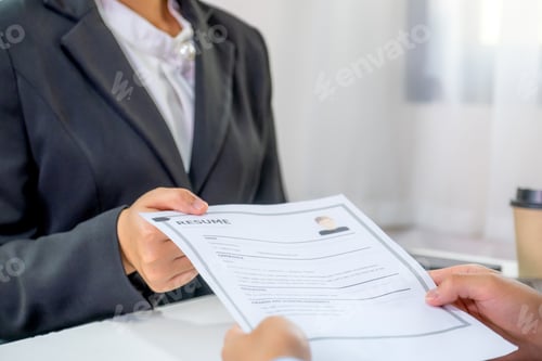 Preview: Office executives interviewing job applicants in the meeting room.