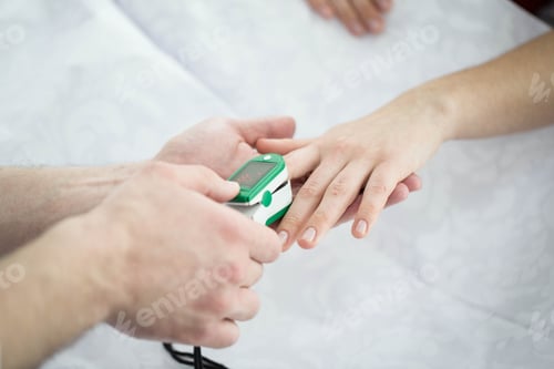 Preview: Patient Finger Pulse Trace Oximeter close-up. Taking Pulse