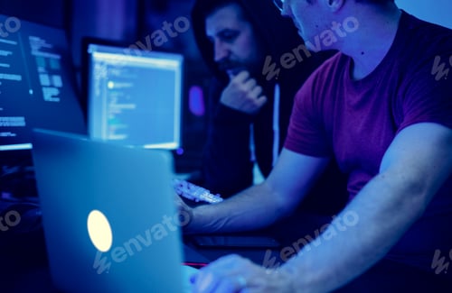 Preview: Programmers working on computer program