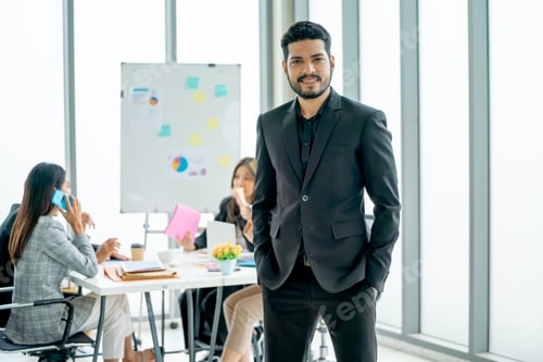 Preview: Portrait of Asian business man stand with smart position and look at camera in front of others