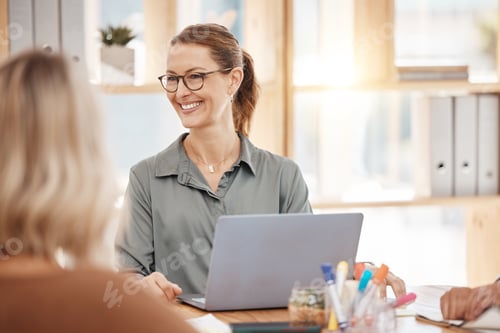 Preview: Mature caucasian businesswoman leading a presentation with her colleagues during a meeting in an of