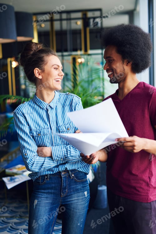 Preview: Happy coworkers making decision on the move