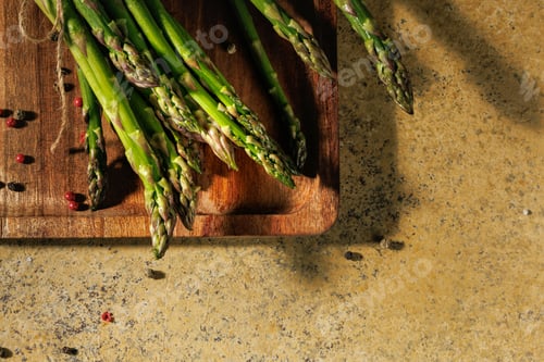 Preview: Asparagus Bundle with Peppercorns on Rustic Surface