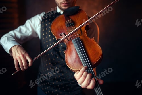 Preview: Male violinist playing classical music on violin