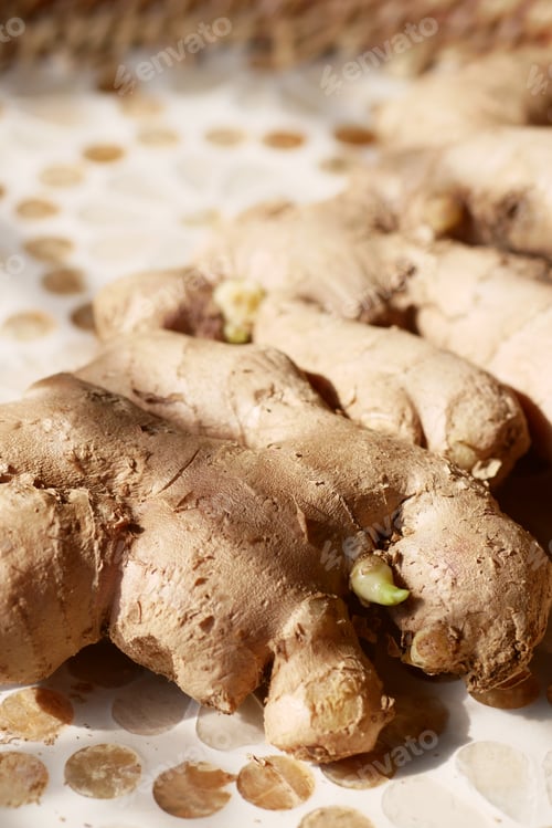 Preview: Close up of Gingers on chopping board.