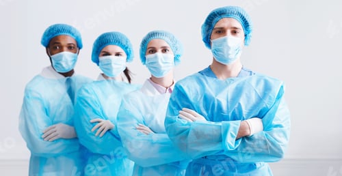 Preview: Surgeons Team Ready for Surgery. Practitioners Wearing Protective Uniforms