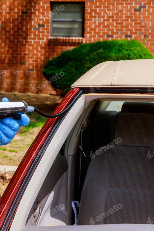 Preview: Special workers replacing windscreen using glue silicone tools windscreen crack broken windshield on