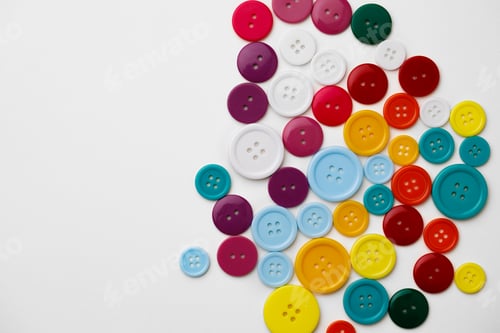 Preview: Assortment of colorful buttons on white background