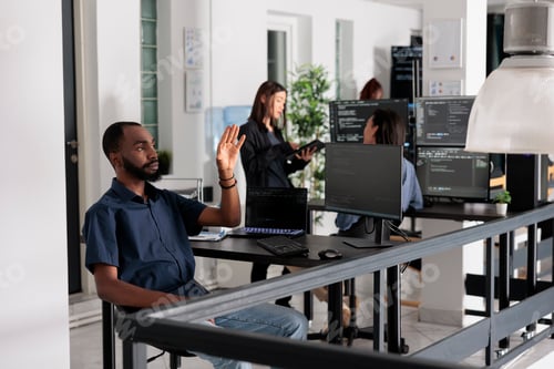 Preview: System engineer looking at ar hologram to work on data script