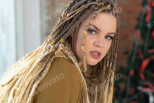 Preview: Close up portrait of a beautiful young woman. Girl with perfect Makeup and Hairstyle.