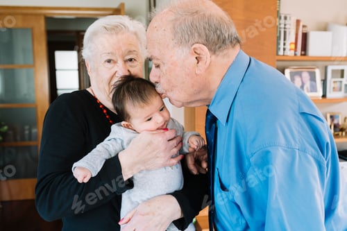 Preview: Great-grandparents with baby at home